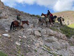 06A Horses carry our luggage in the gorge to Travellers Pass 4133m on the way to Ak-Sai Travel Lenin Peak Camp 1 4400m